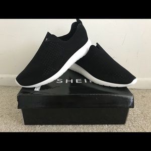 Black slip-on sneakers